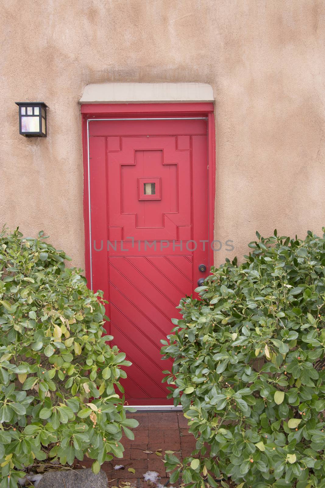 Red door on Canyon Road, Santa Fe, New Mexico.