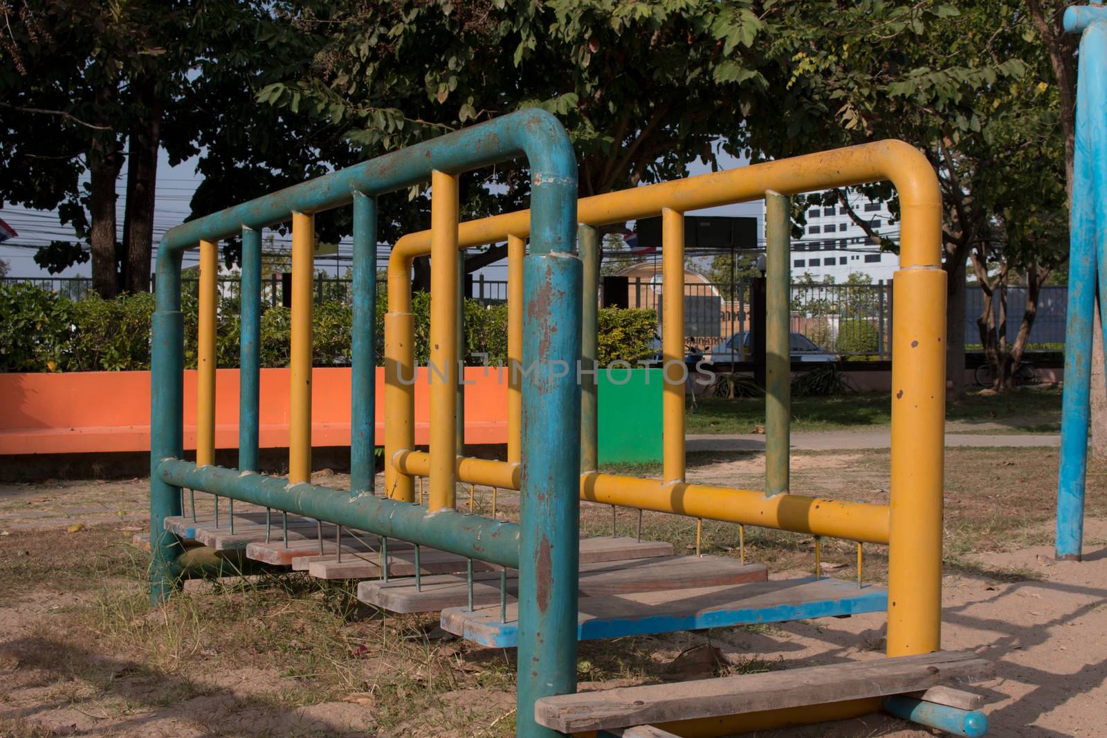 Climbing  fun playing on equipment at a playground.