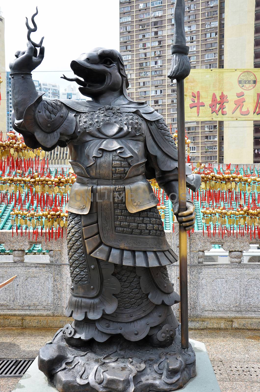 Hong Kong, China - June 25, 2014: Chinese Zodiac Bronze Snake Stature at Sik Sik Yuen Wong Tai Sin Temple