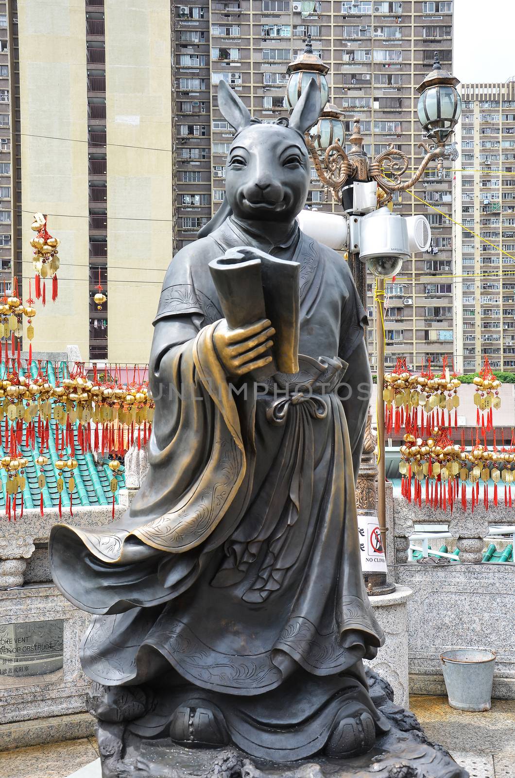 Hong Kong, China - June 25, 2014: Chinese Zodiac Bronze Rabbit Stature at Sik Sik Yuen Wong Tai Sin Temple