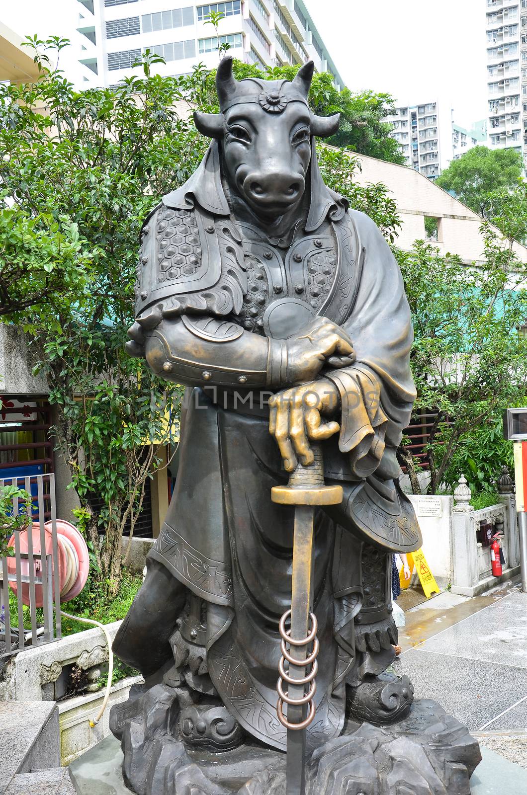Hong Kong, China - June 25, 2014: Chinese Zodiac Bronze Ox Stature at Sik Sik Yuen Wong Tai Sin Temple