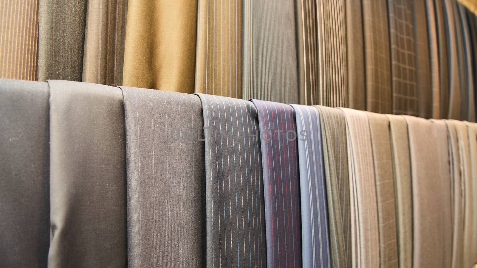 Various suit fabrics close-up by sarymsakov