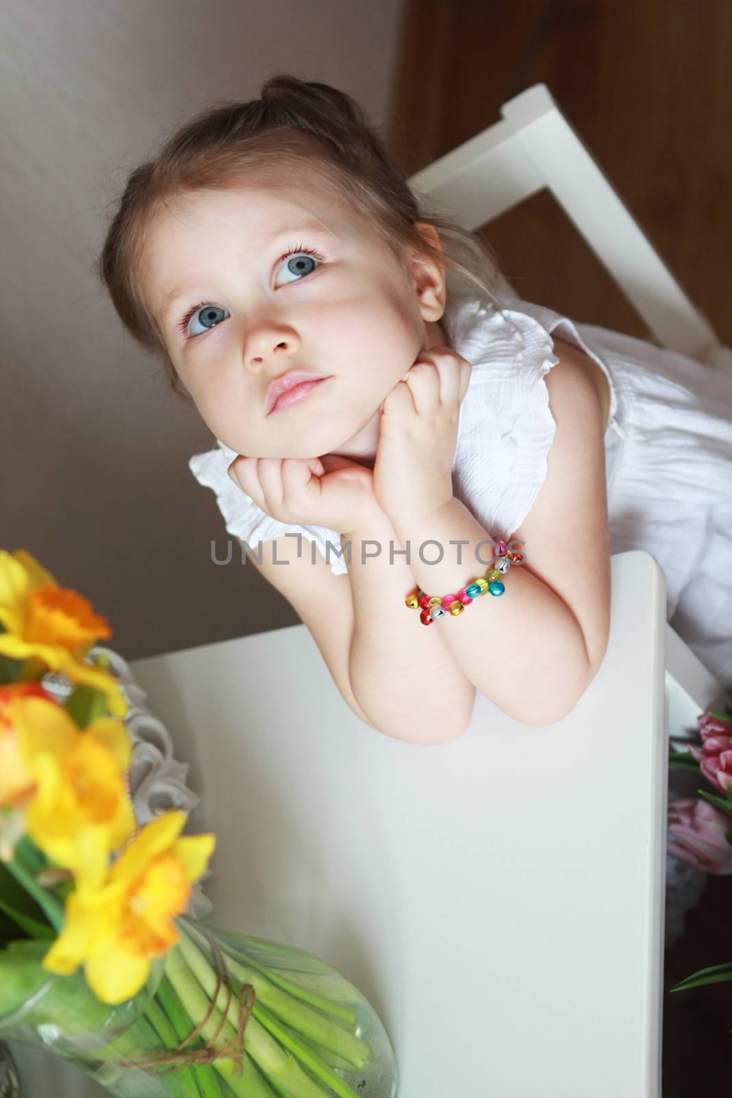 Beautiful small kid girl in studio