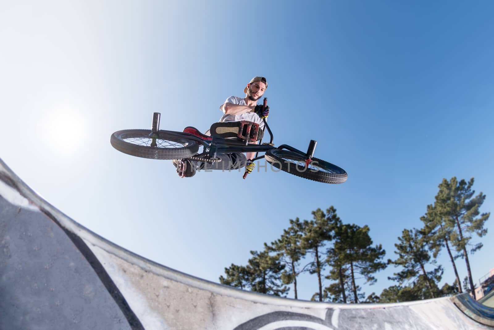 High BMX jump in a skate park.