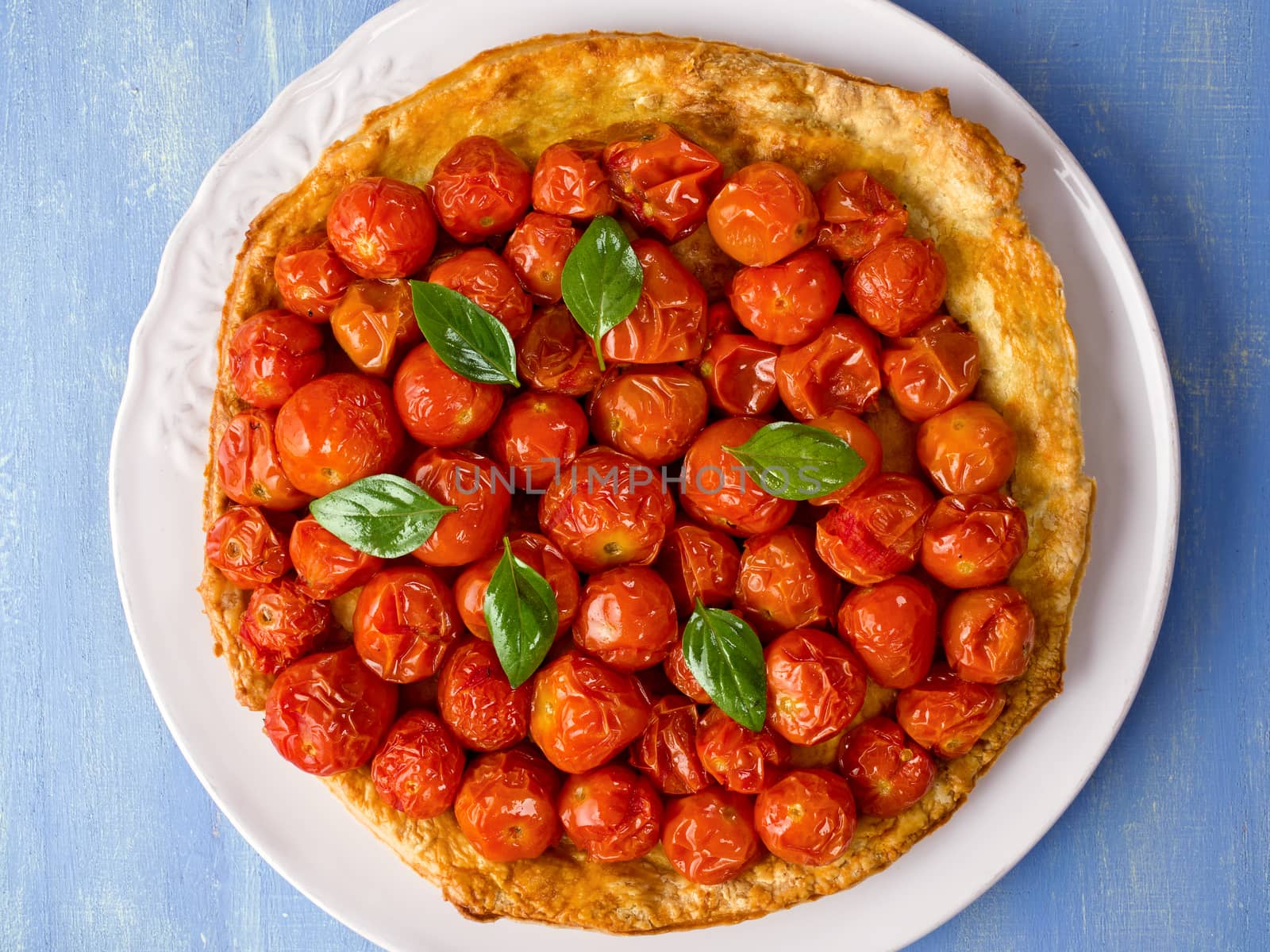 close up of rustic cherry tomato tarte tatin