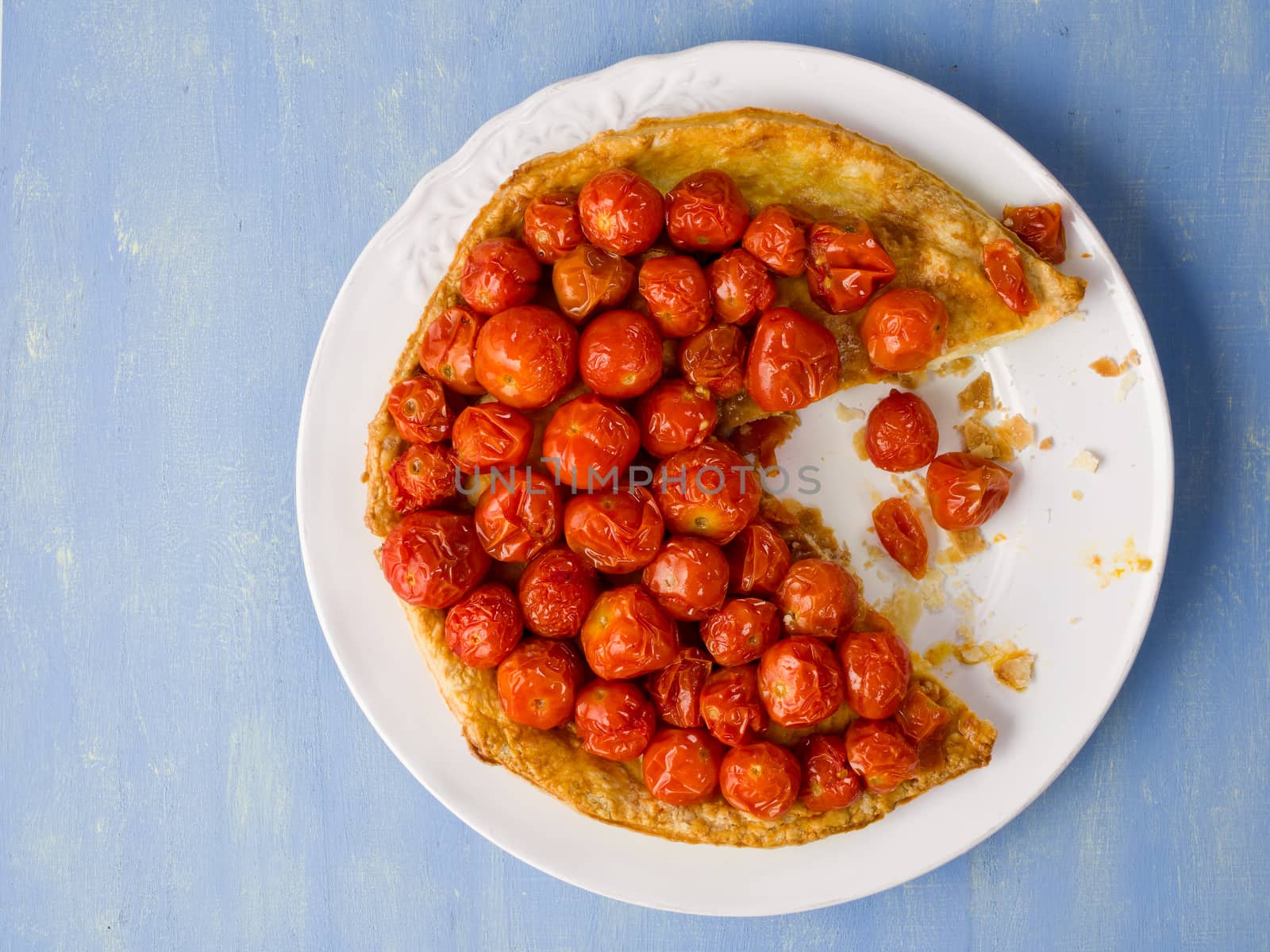 close up of rustic cherry tomato tarte tatin