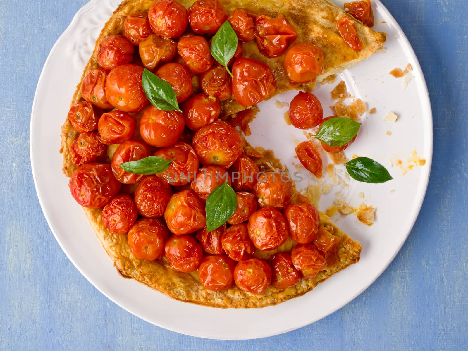 close up of rustic cherry tomato tarte tatin