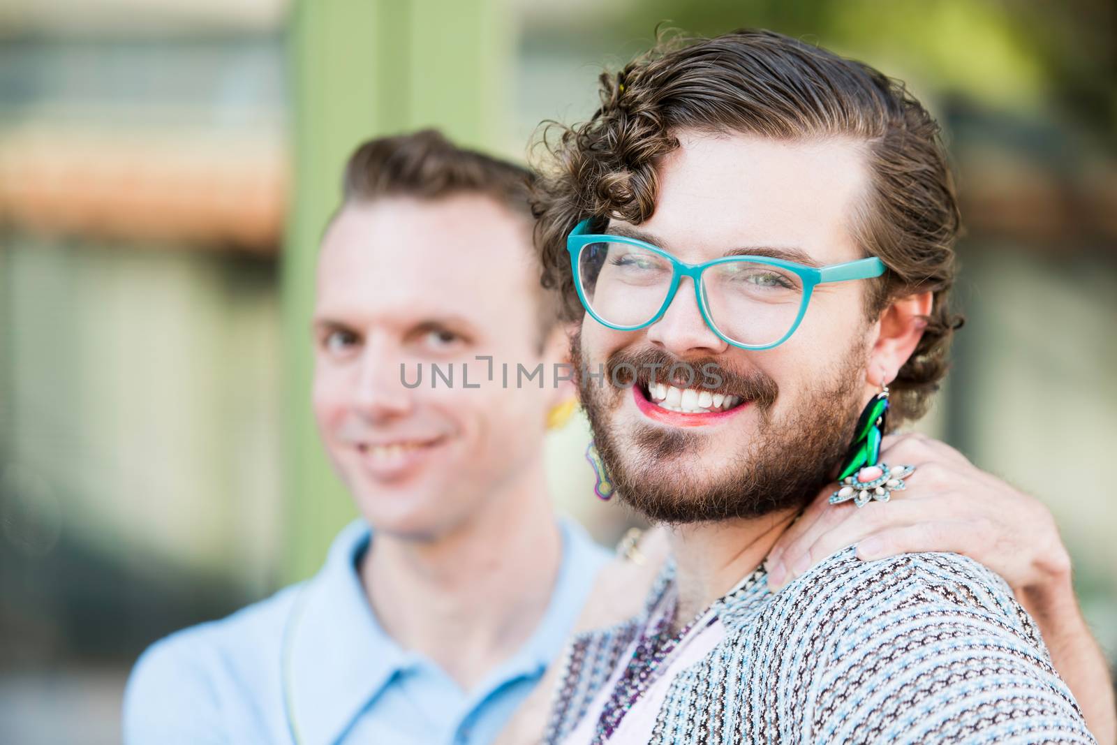 Focus on one member of gender fluid young male couple