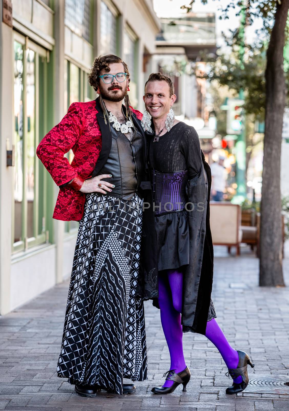 Handsome gender fluid young men in flamboyant drag