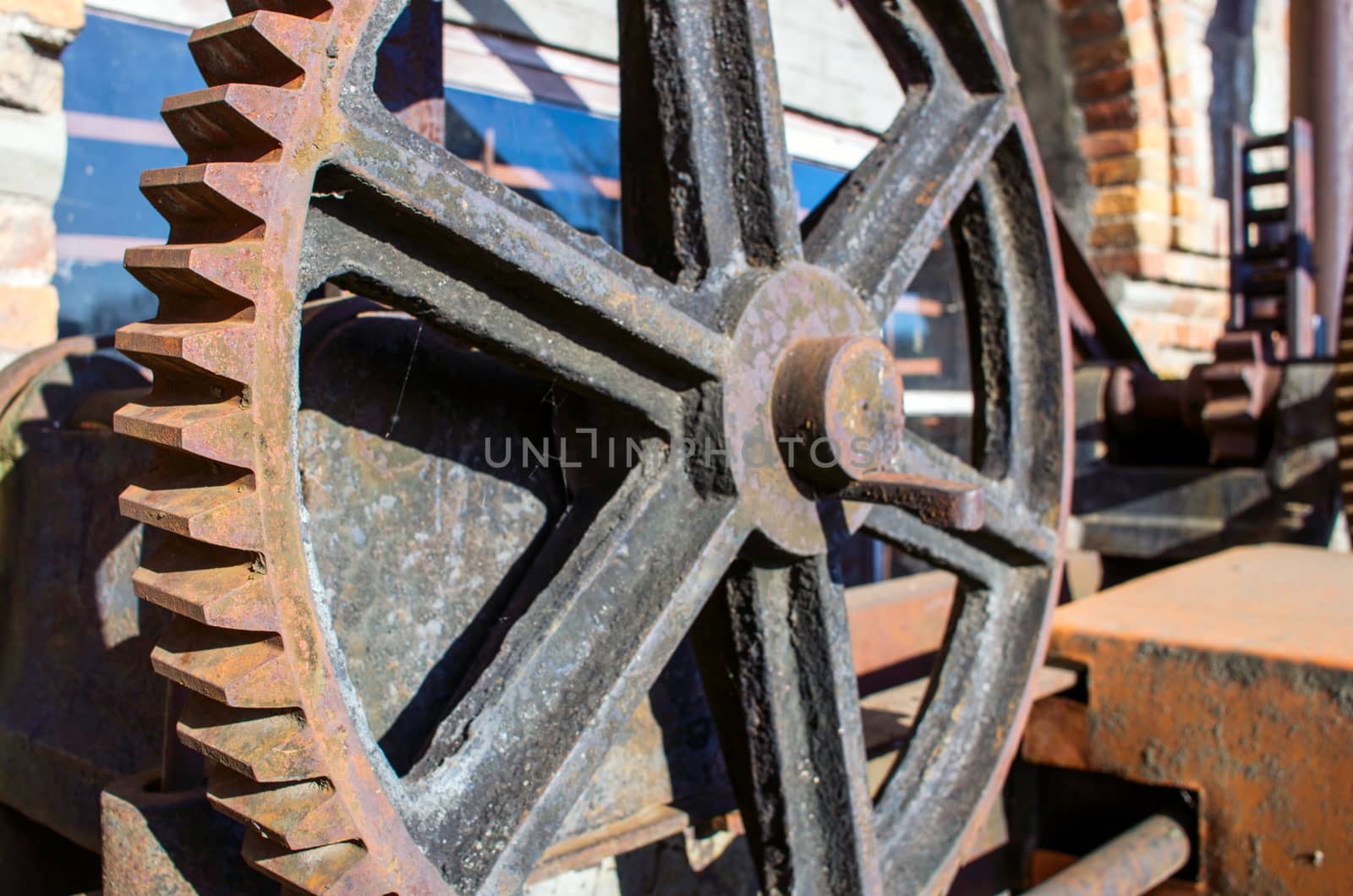 Old rusty gears, machinery parts. by dolnikow