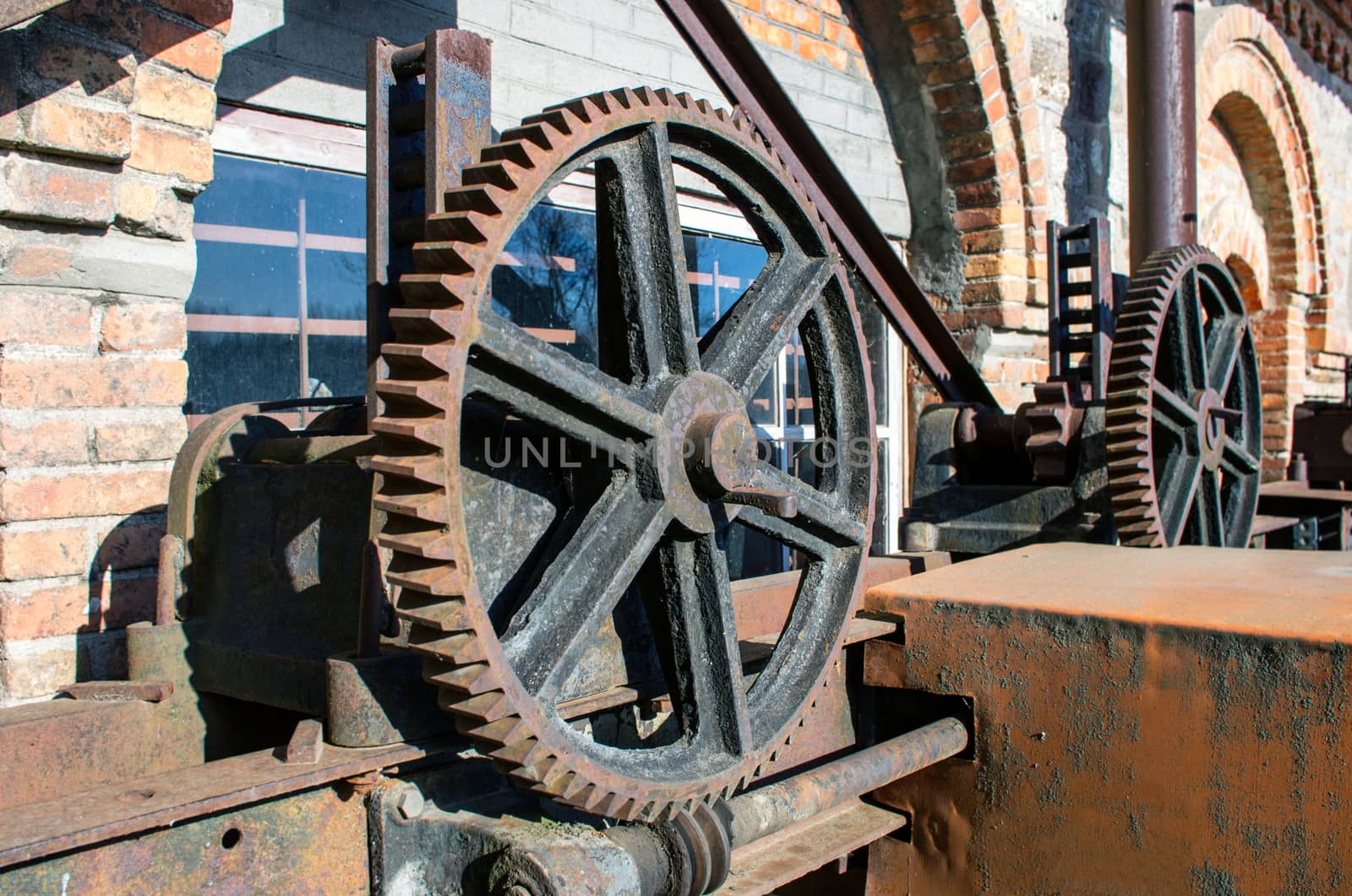 Old rusty gears, machinery parts. by dolnikow