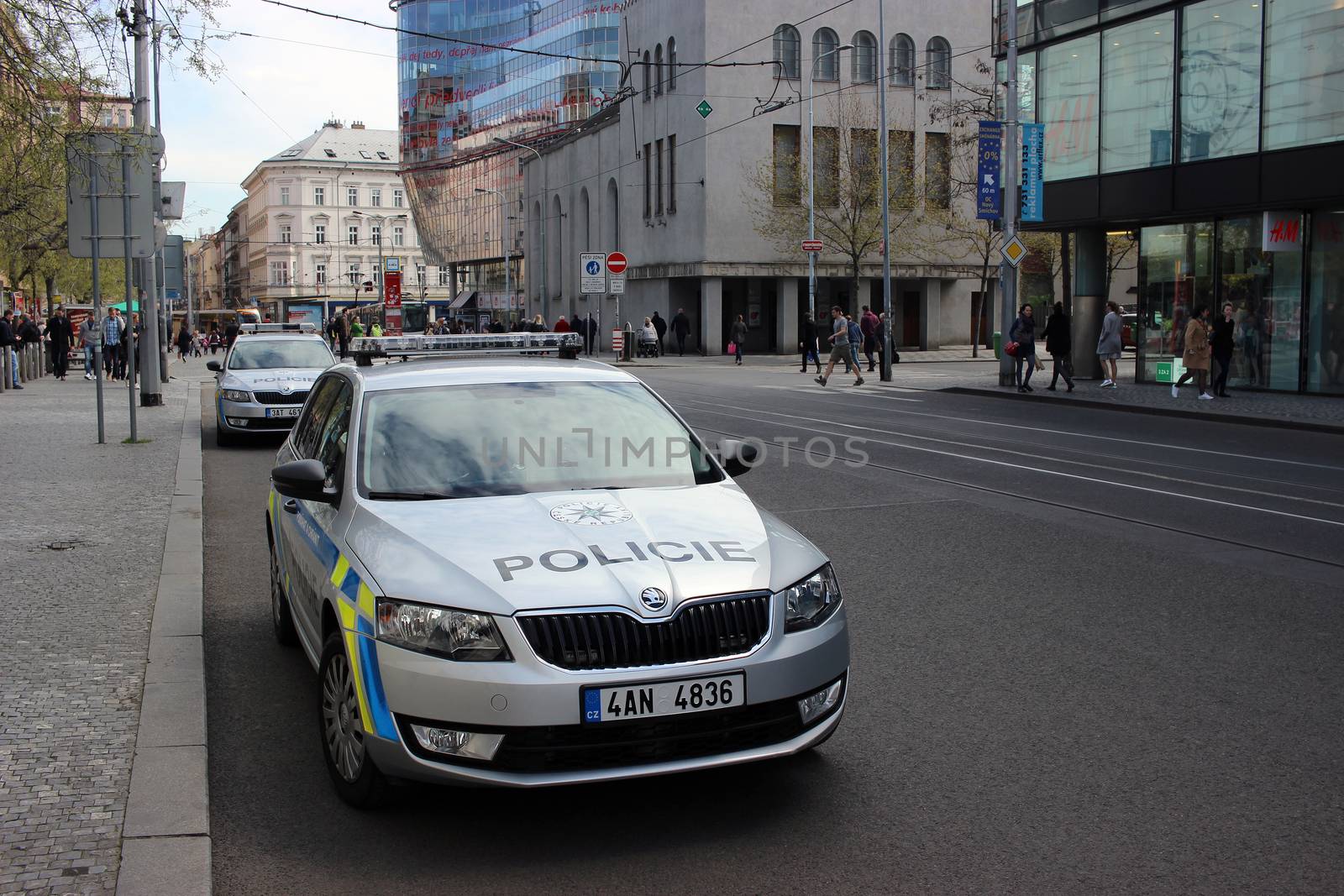 Prague, Czech Republic - April 22, 2016: Two Skoda Octavia Police Cars Parked on the Street in Prague, Nobody in vehicles
