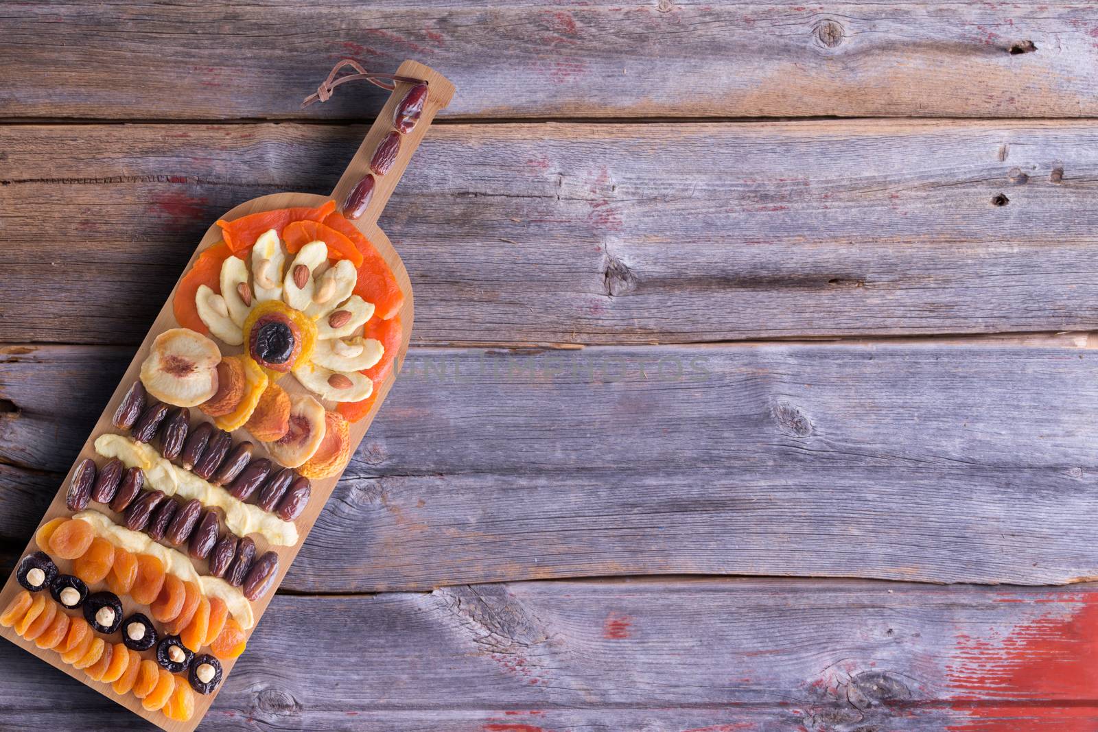 Artistic colorful arrangement of dried produce by coskun