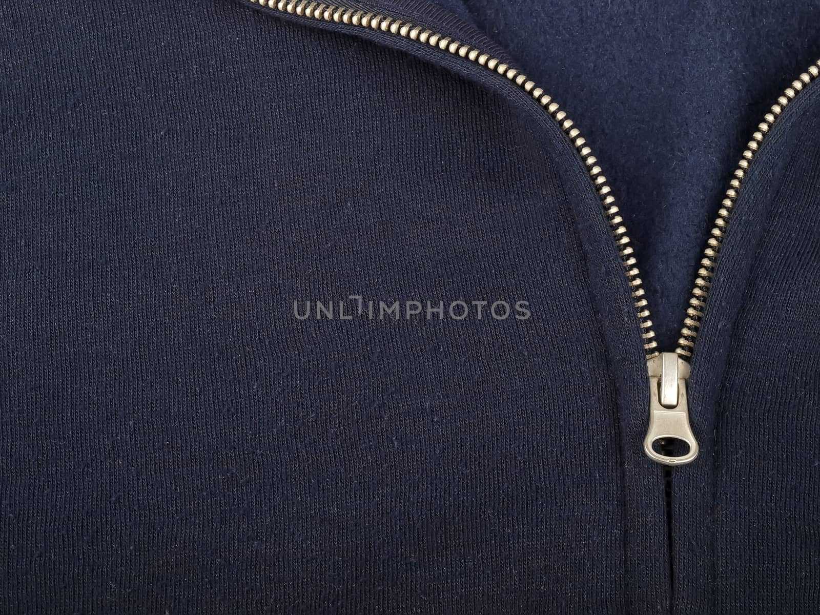 detail of sweatshirt with zipper, studio shot
