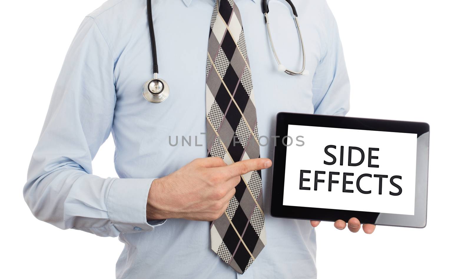 Doctor holding tablet - Side effects by michaklootwijk