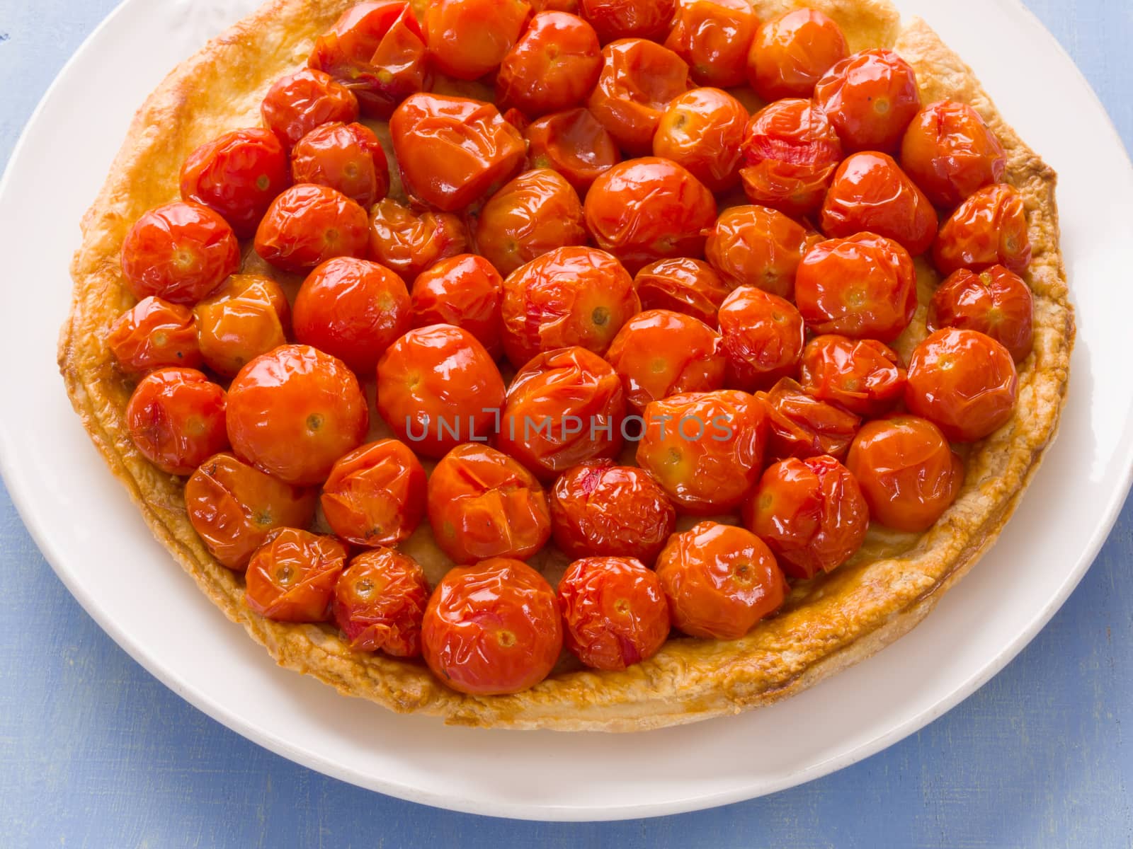 close up of rustic cherry tomato tarte tatin