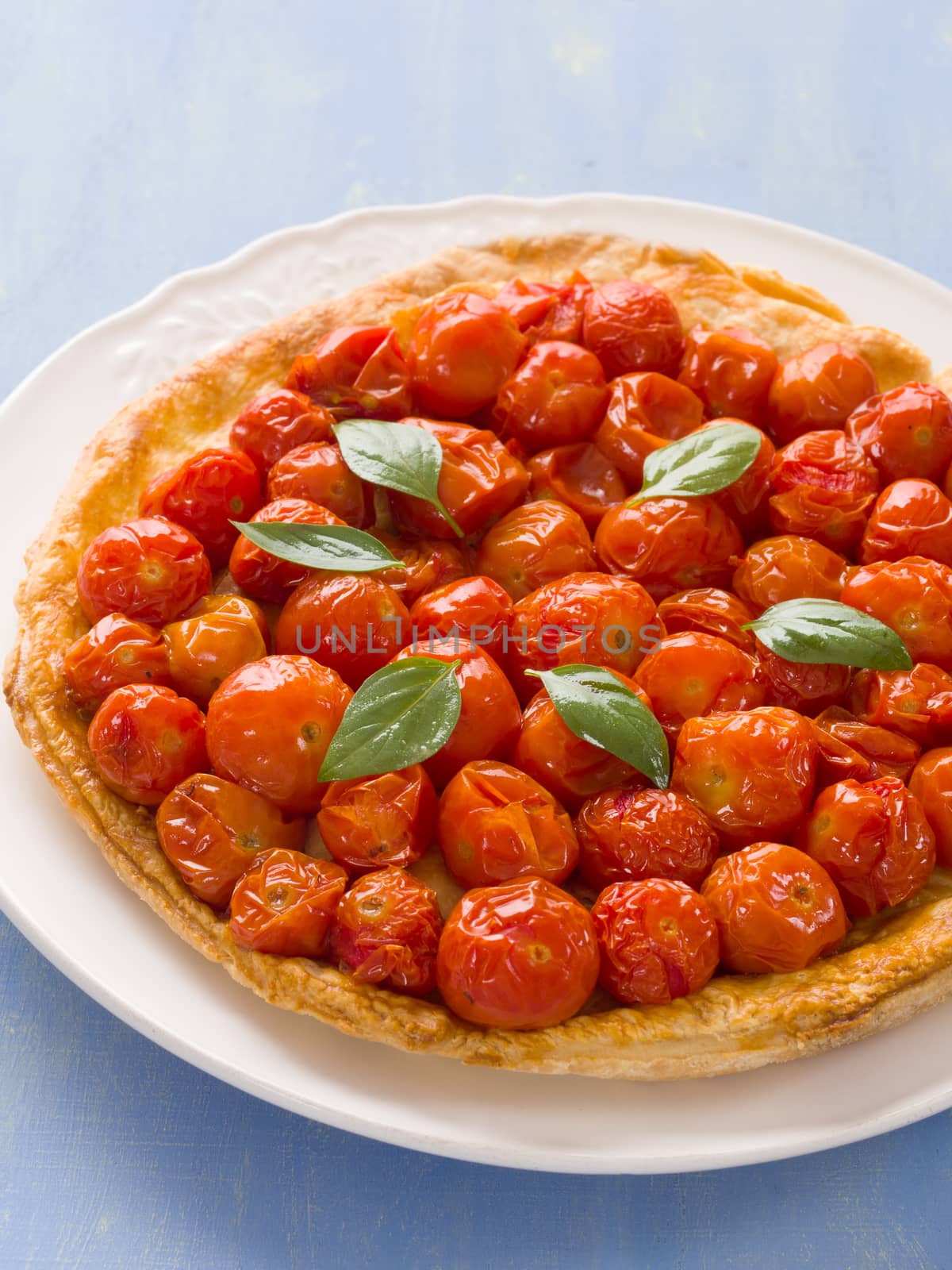 close up of rustic cherry tomato tarte tatin