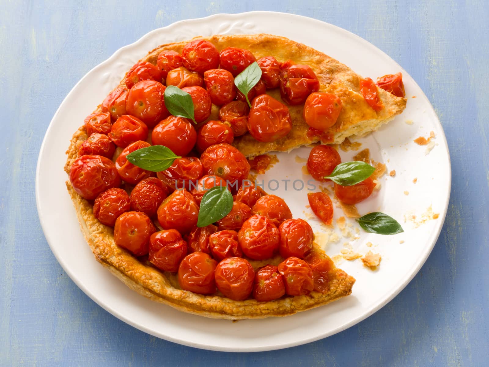 close up of rustic cherry tomato tarte tatin