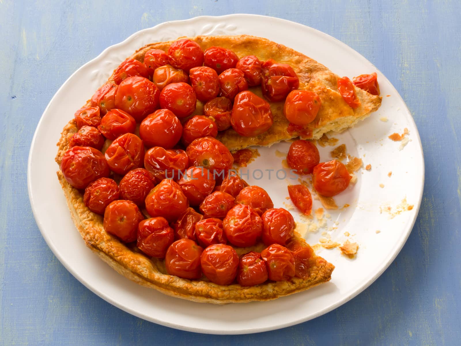 close up of rustic cherry tomato tarte tatin