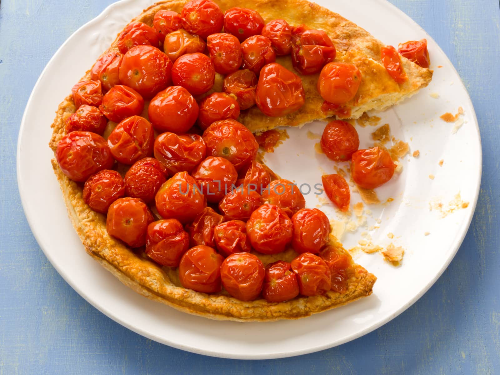 close up of rustic cherry tomato tarte tatin