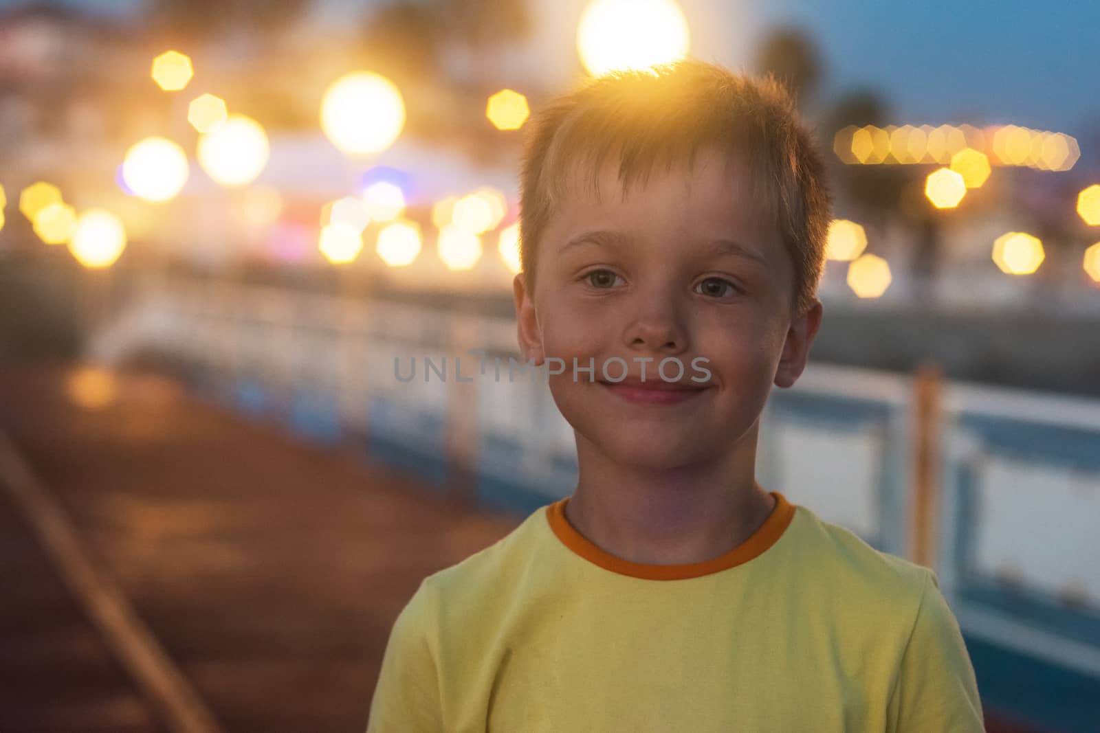 Kid boy walking at Alania beach, Turkey