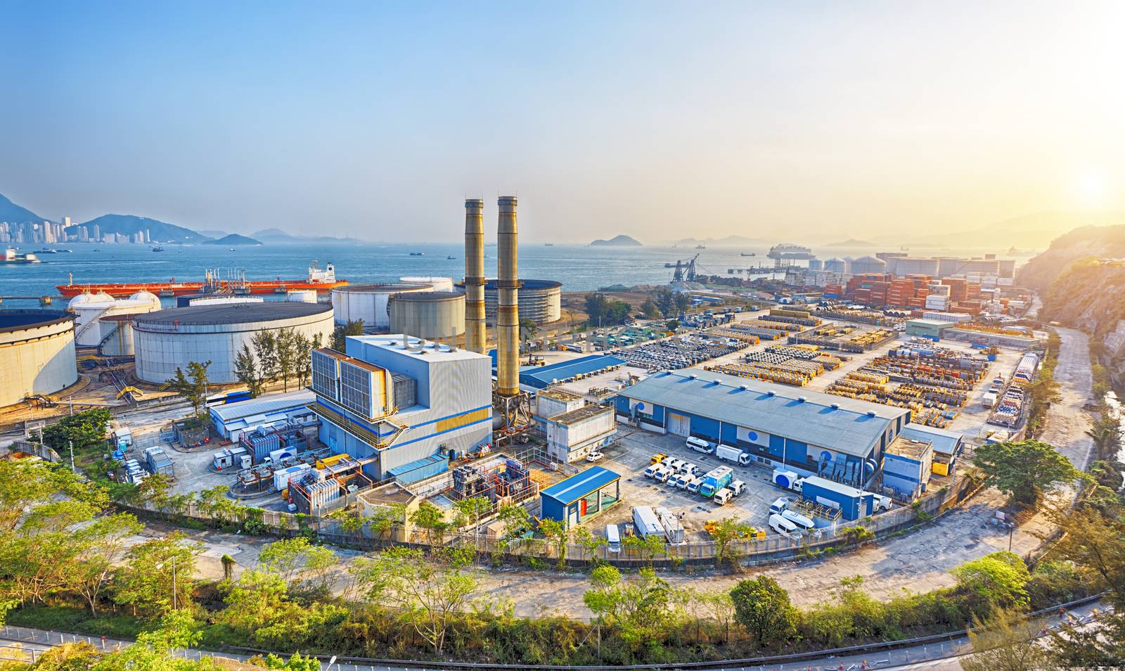 petrochemical industry on sunset , hong kong coal power station and oil tank