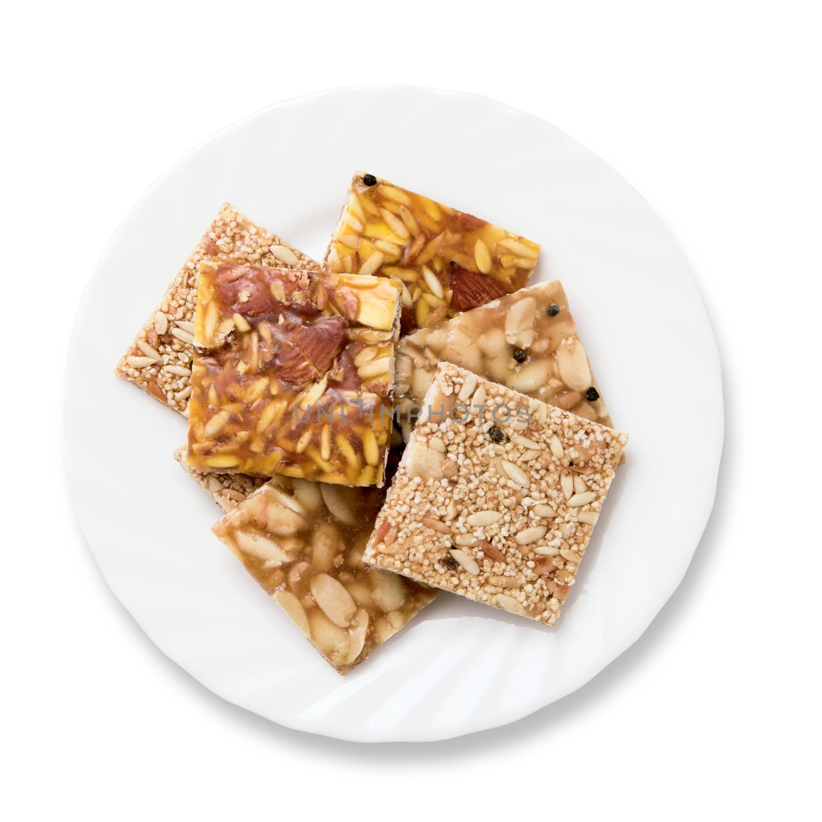 Various kinds of Indian sweet brittle on a plate