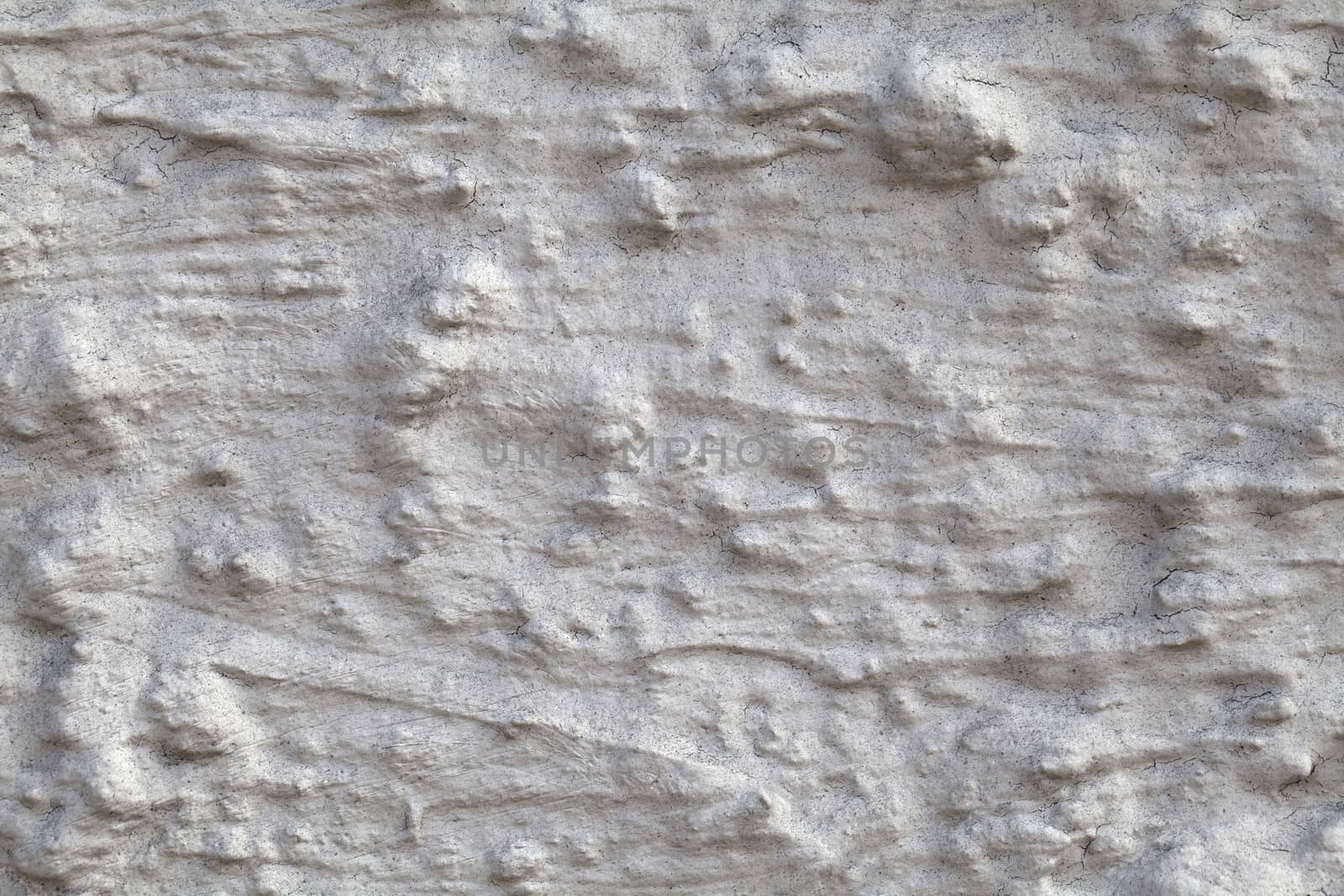 Macro shot of uneven wall plaster, texture