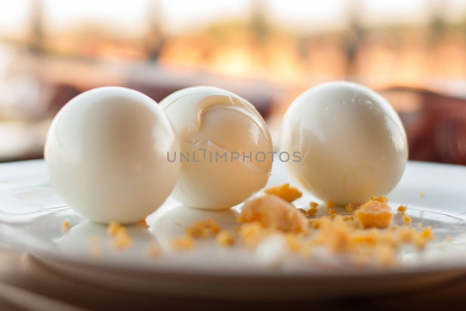 Three boiled eggs at plate 