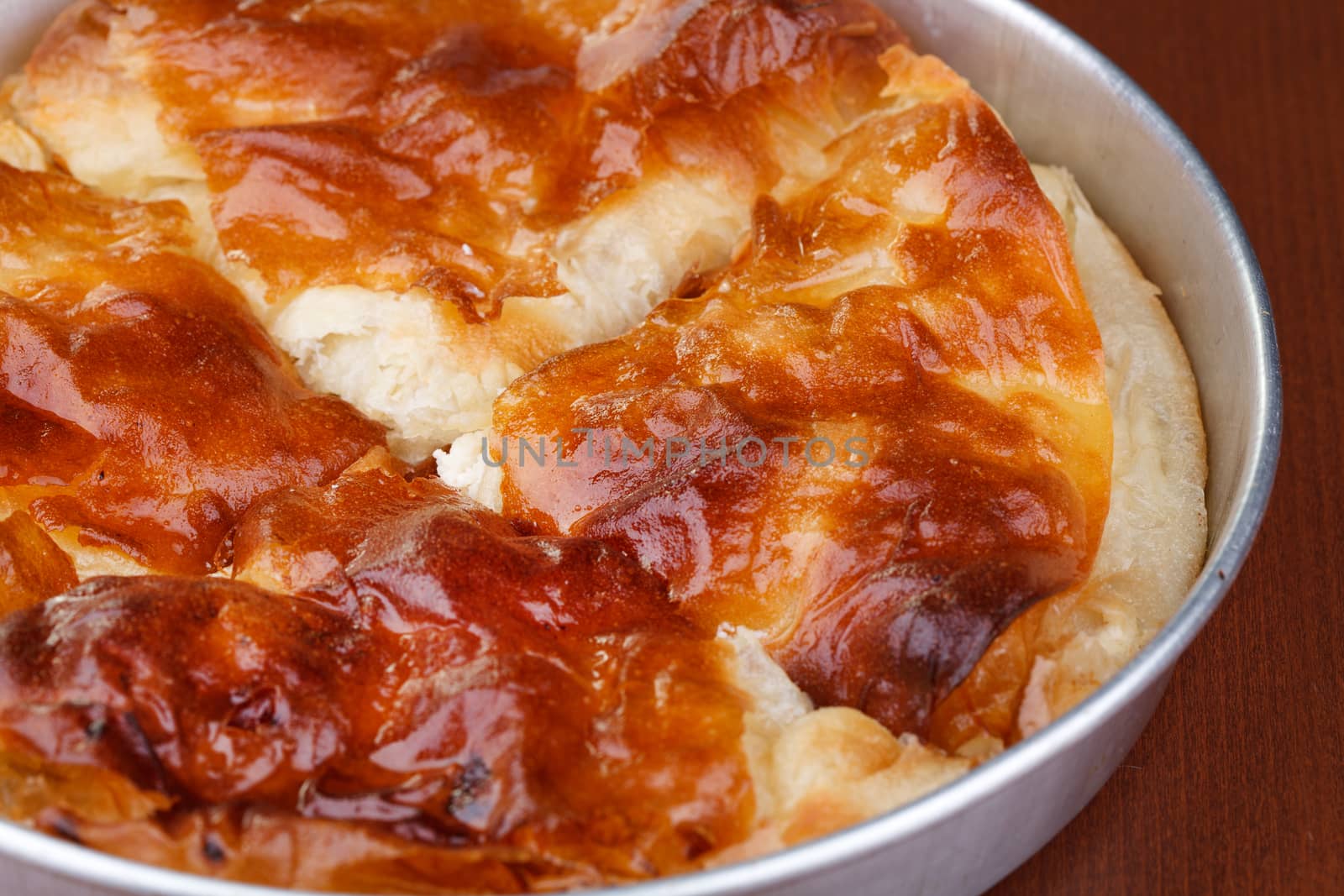 Burek (pie with cheese) is traditional Balkanian meal