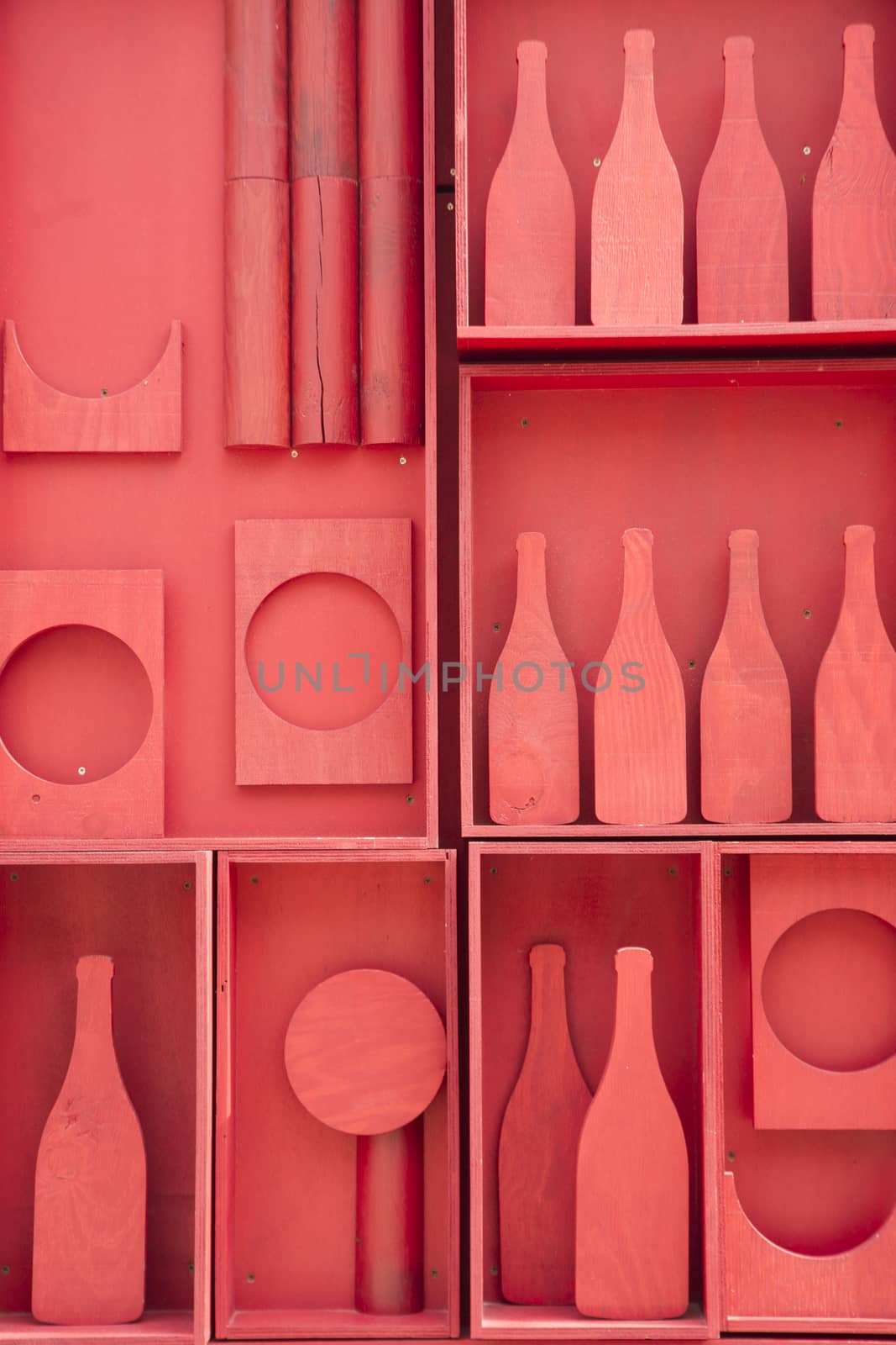 Stylized representation of a small cellar of wine bottles