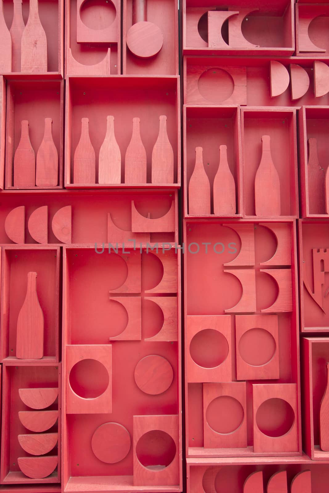 Stylized representation of a small cellar of wine bottles