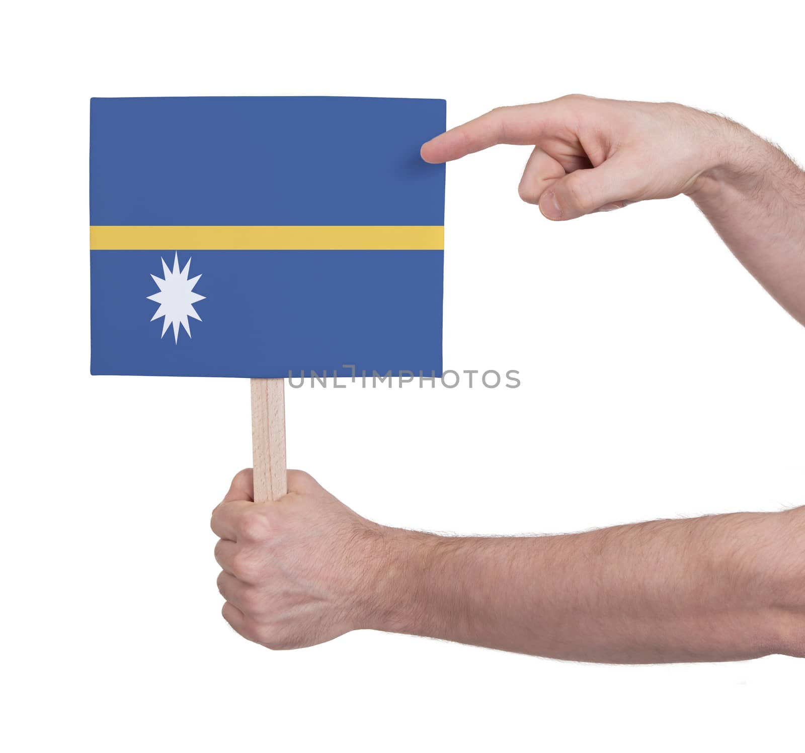 Hand holding small card, isolated on white - Flag of Nauru