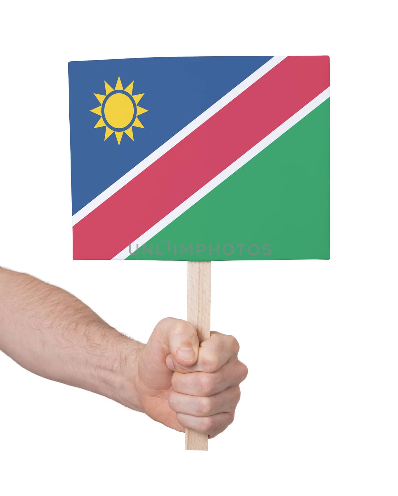 Hand holding small card - Flag of Namibia by michaklootwijk