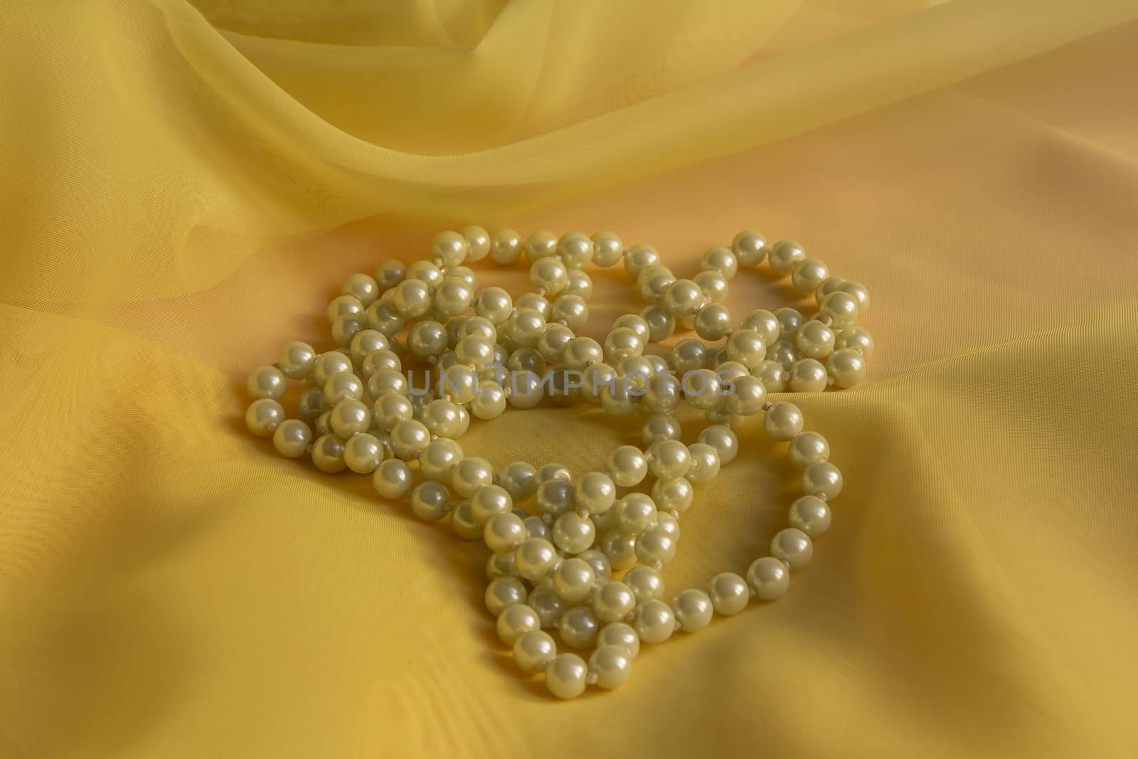 White Pearl Necklace with a Yellow soft silk