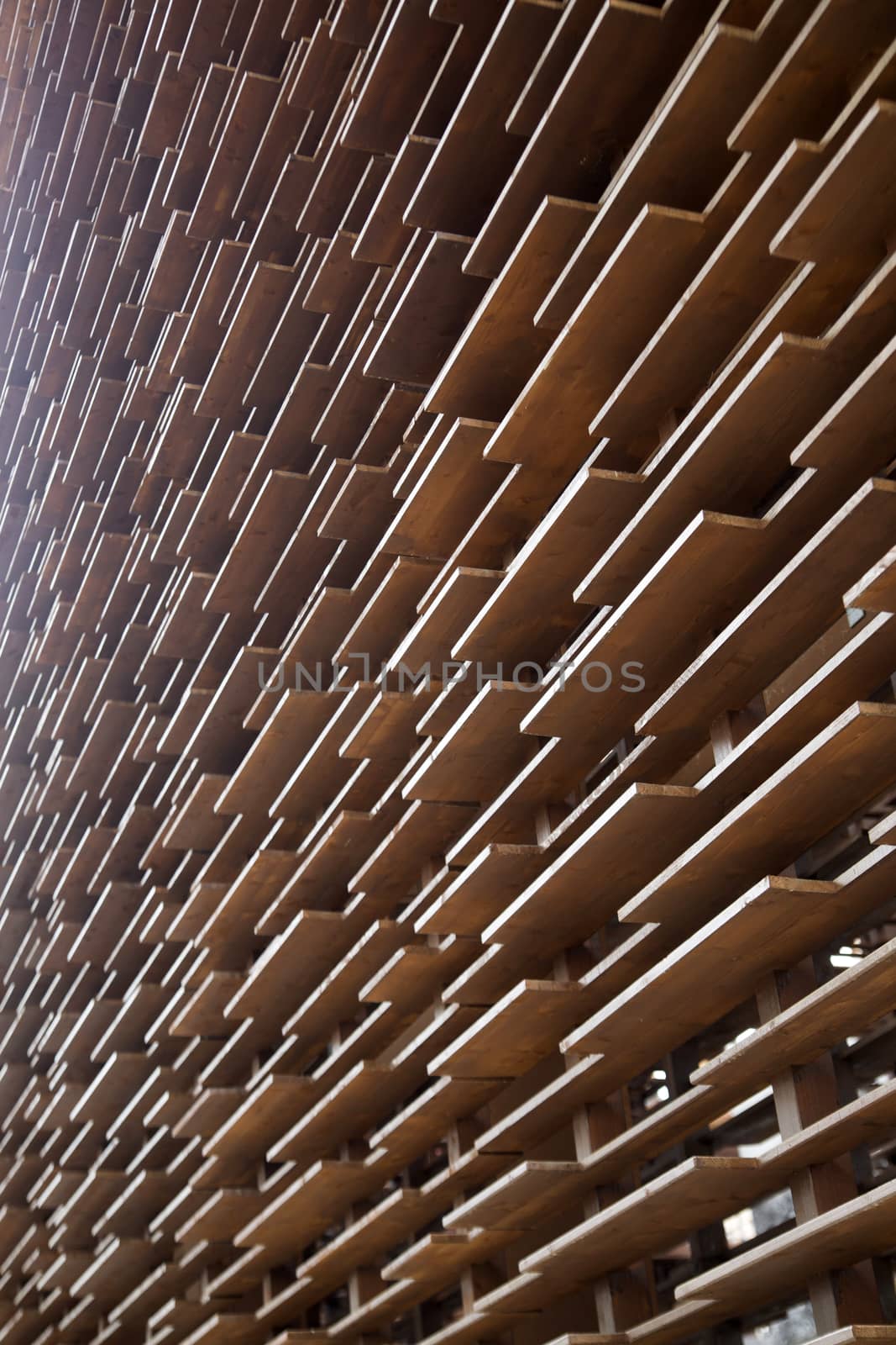 Perimeter wall of building built in wooden boards