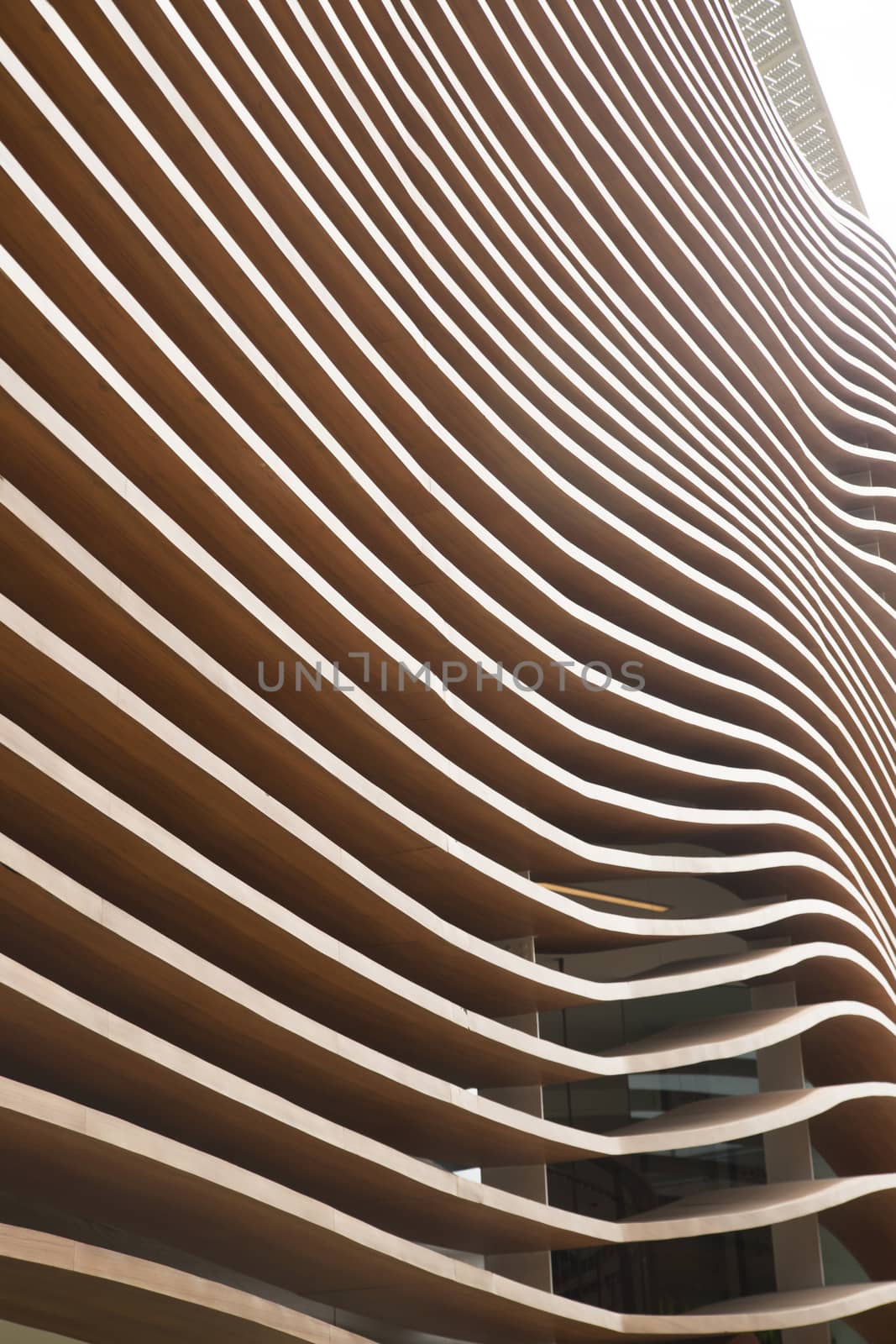 The outer wall of a commercial building representative waves of the sea