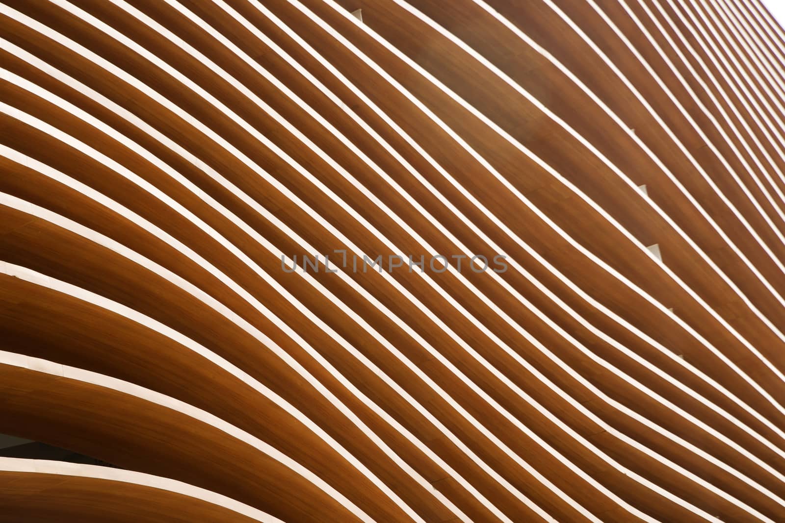 The outer wall of a commercial building representative waves of the sea