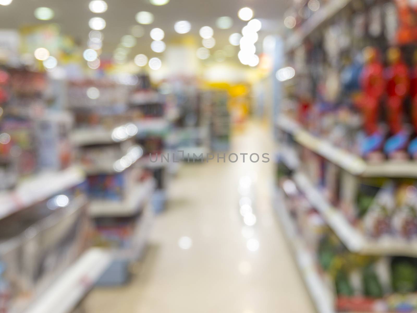 Blurred of kids toy store background by fascinadora