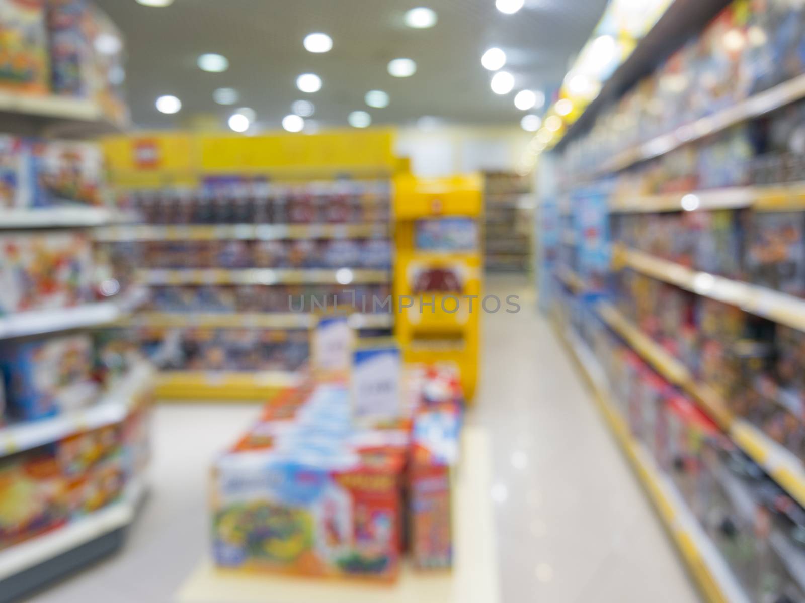 Blurred of kids toy store background by fascinadora