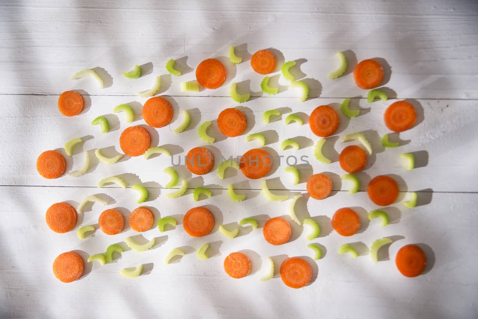 Presentation of vegetables celery and carrots cut into small slices