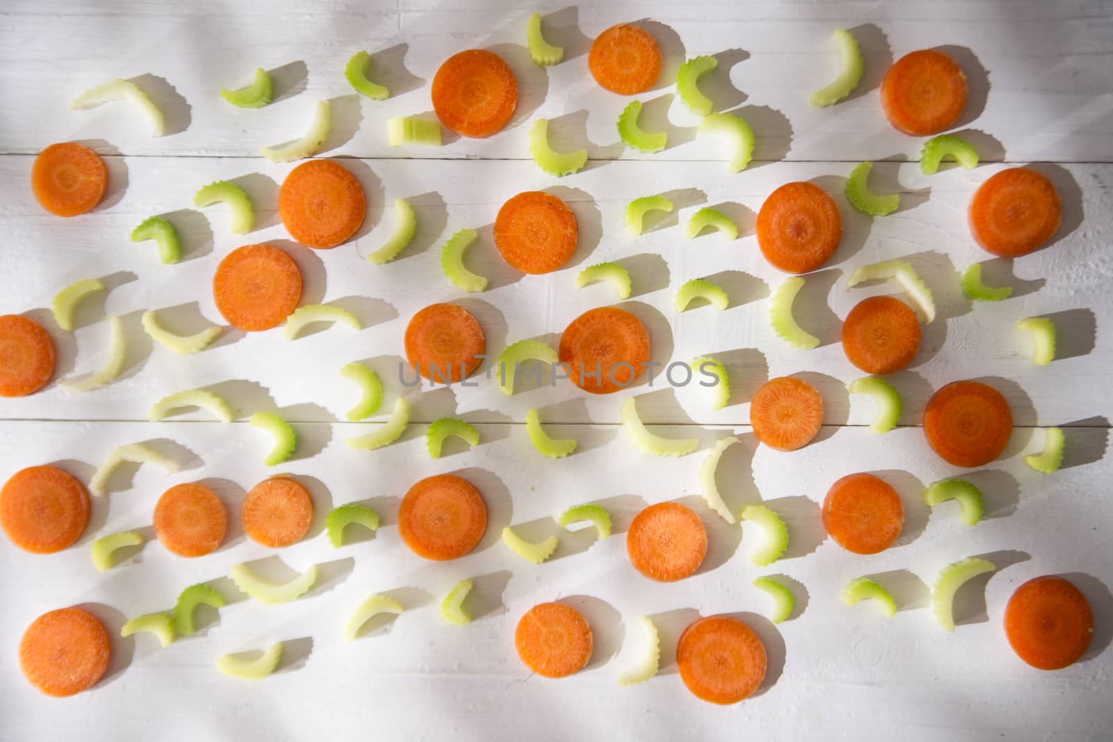 Presentation of vegetables celery and carrots cut into small slices