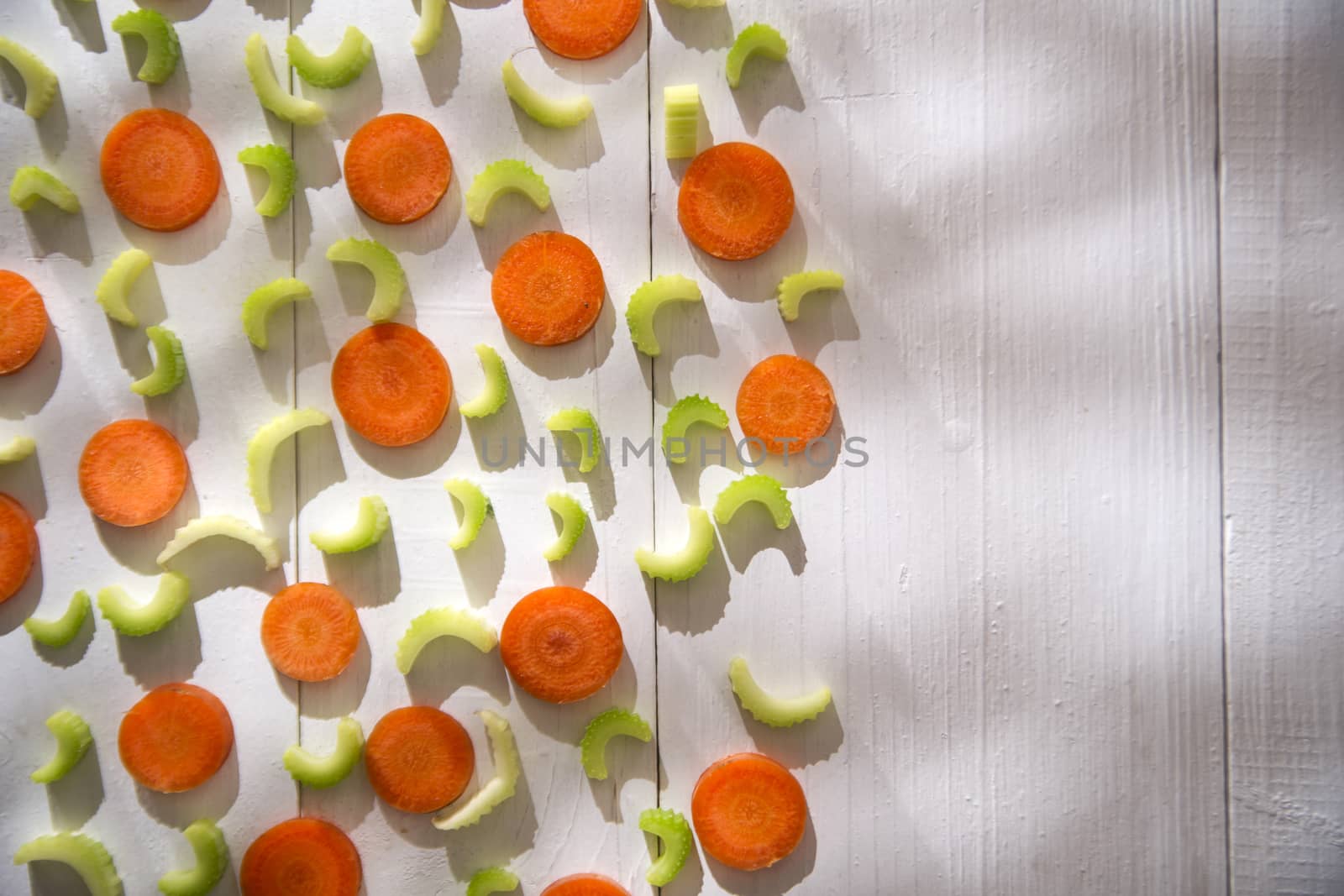 Presentation of vegetables celery and carrots cut into small slices