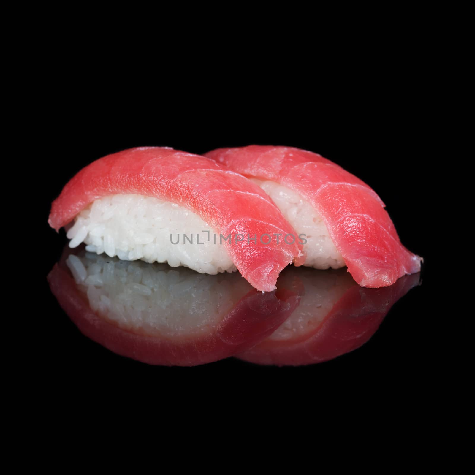 Tuna sushi on black background