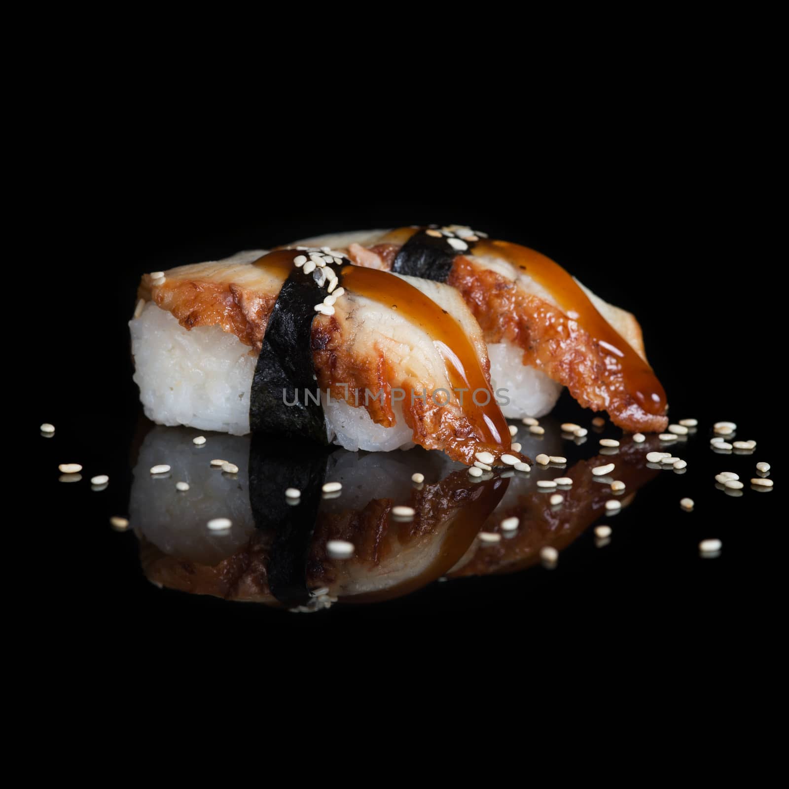 Eel sushi on black background