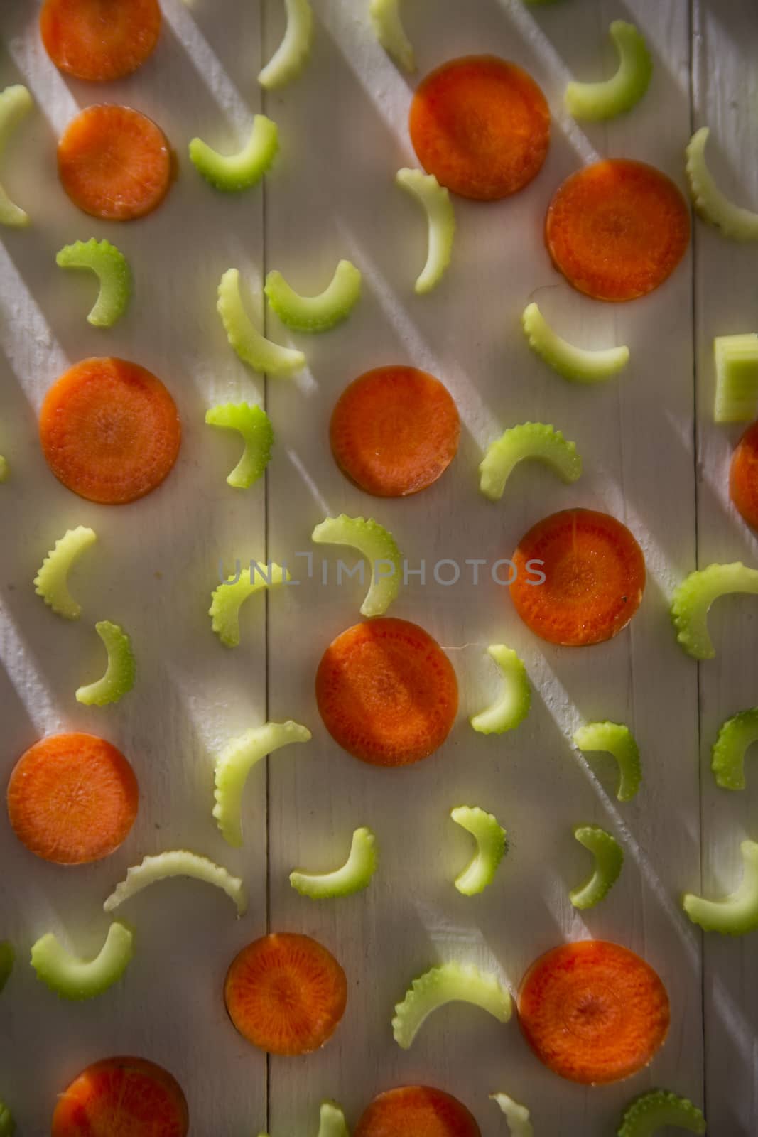 Presentation of vegetables celery and carrots cut into small slices
