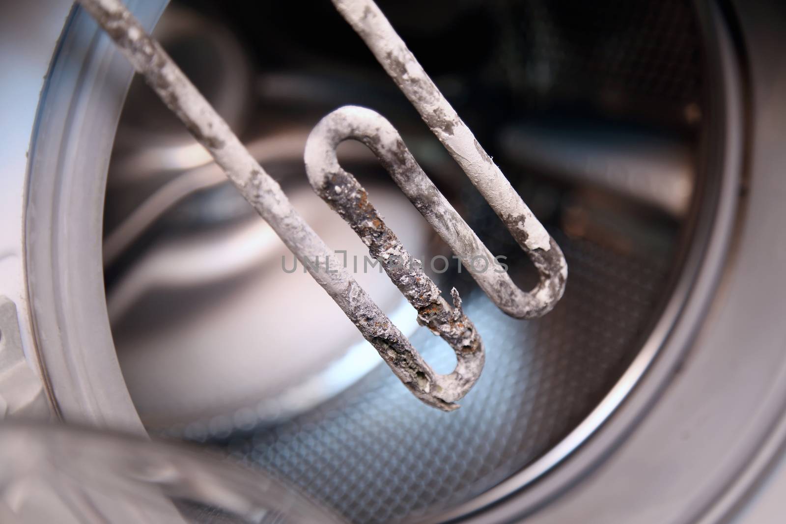 details closeup shot of electric heater from washing machine