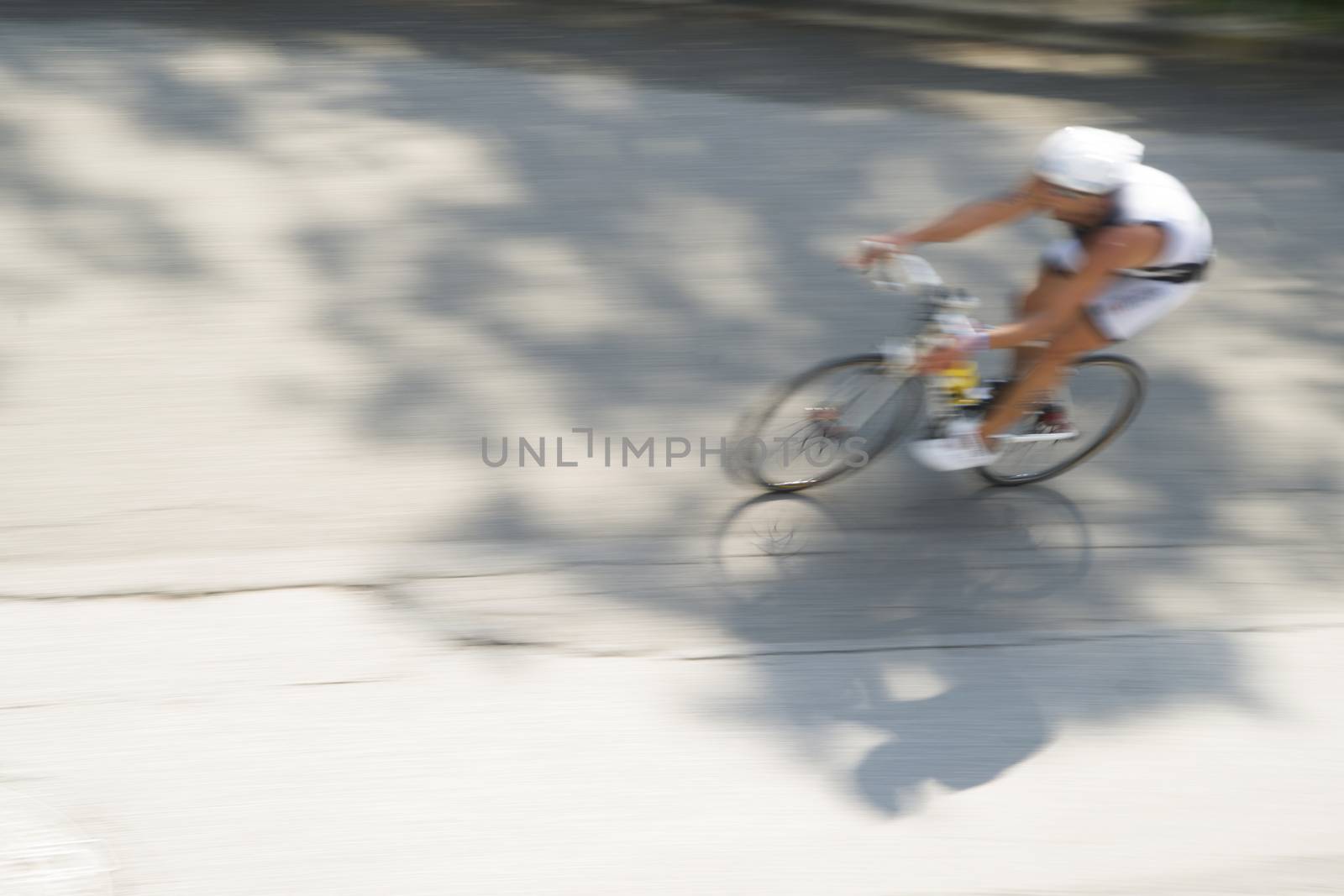 Cycling race with representation runner with blur