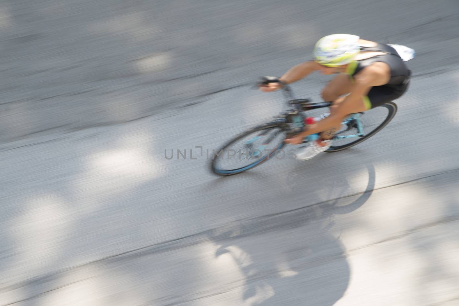 Cycling race with representation runner with blur