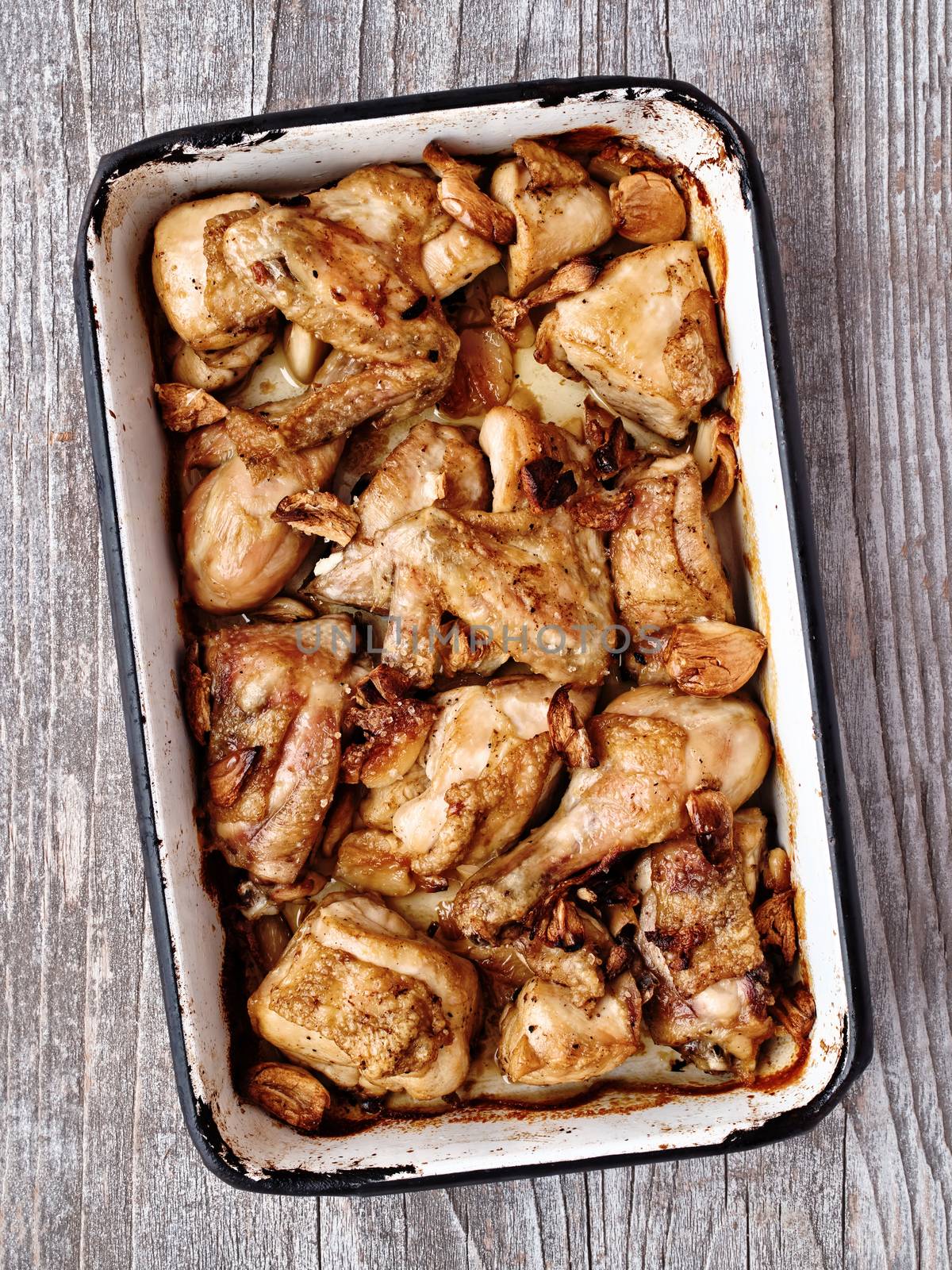 close up of rustic golden roast chicken casserole 